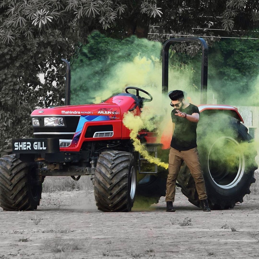 Mahindra Tractor - Yellow Smoke Background