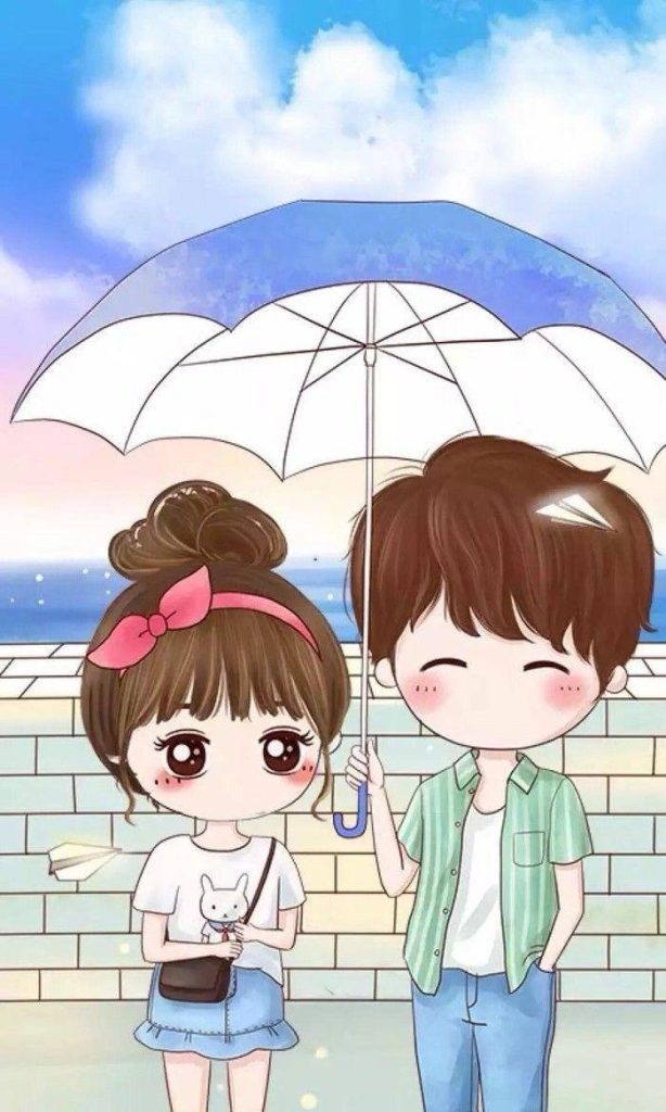 Cute Boy And Girl Under The Umbrella