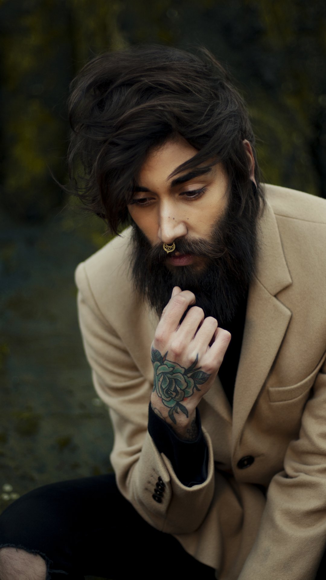 Beard Man With Tattoo In Hand